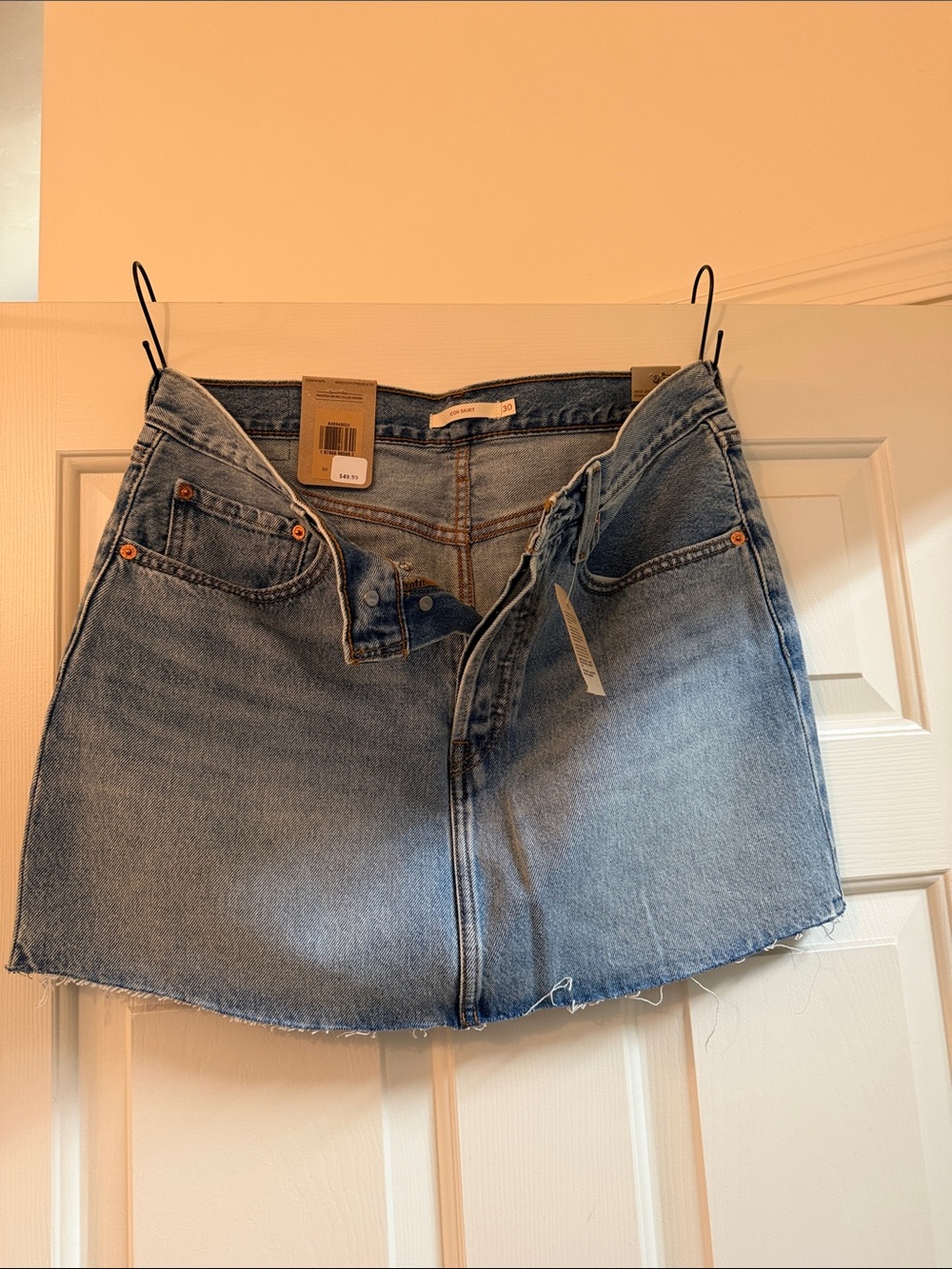 Levi’s Denim Mini Skirt with Raw Hem - Light Blue